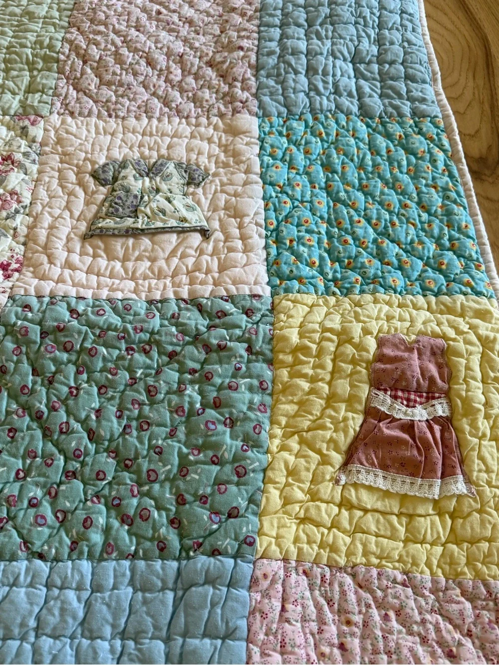 Land Of Nod Patchwork Baby Quilt in Pastel Blue, Pink, Yellow, Cream